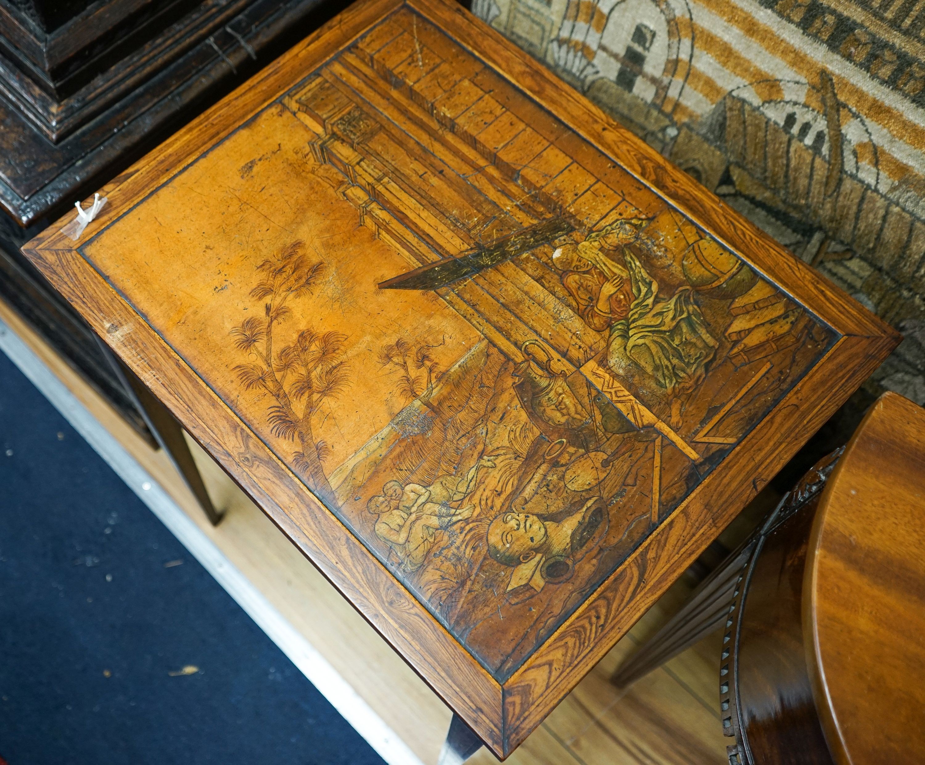 A 19th century Continental walnut side table, the top with penwork decoration and a tinted scene of figures among Roman ruins, width 41cm, depth 50cm, height 69cm